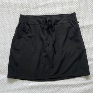 Cute athletic skirt! Has built in spandex shorts. Incredibly versatile!